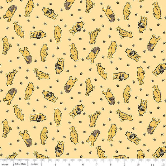 Winnie the Pooh Toss Sunshine Fabric by the Yard
